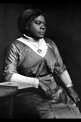 A portrait of Ida B. Wells-Barnett circa 1893, an early leader in the women’s and civil rights movements. Wells was active in the women’s suffrage movement but was asked not to march with white suffragists in 1913. Albumen silver print by American female photographer, Sallie Garrity. Photo from the National Portrait Gallery, courtesy of Wikimedia Commons.