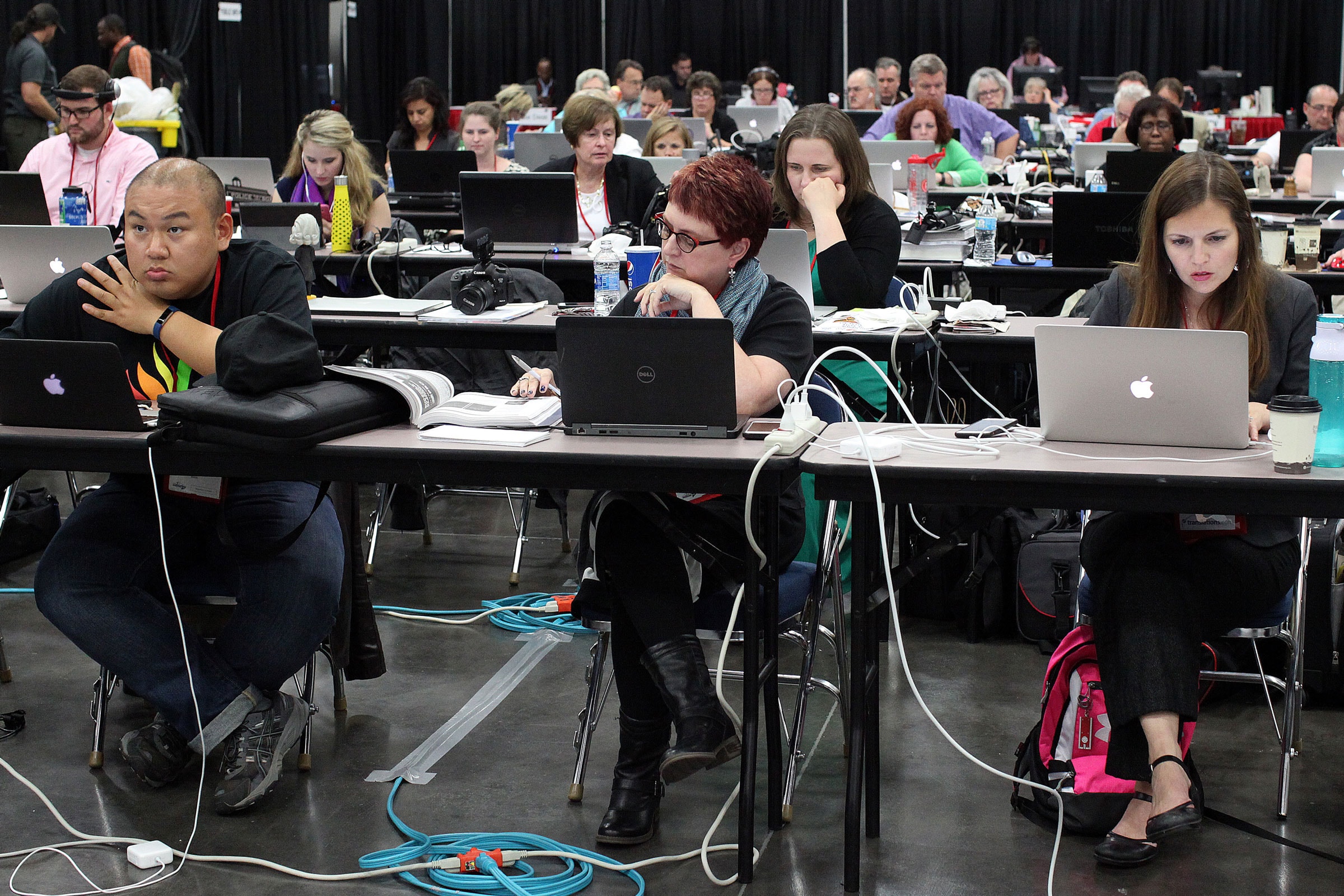 The newsroom of the 2016 United Methodist General Conference in Portland, Ore. is a busy place with journalists covering sessions.