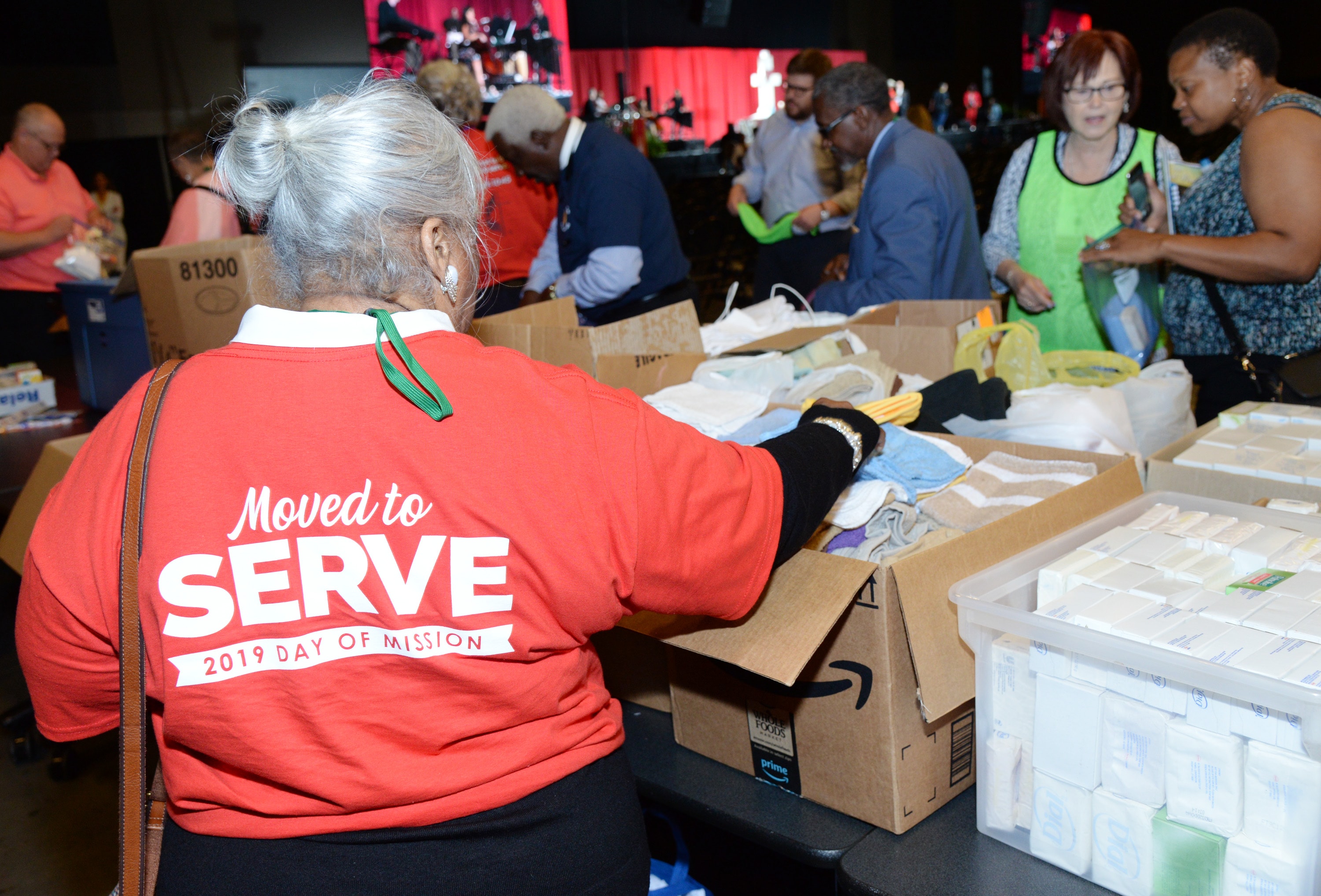 This year’s mission service was unique in that in addition to having Bishop Swanson deliver the message, he also gave a call to action for everyone to help grab the materials they dropped off at conference earlier in the week to assemble health kits for Mississippi disaster response ministries. The goal was to complete 10,000 kits. The final count of health kits reached approximately 15,000. 