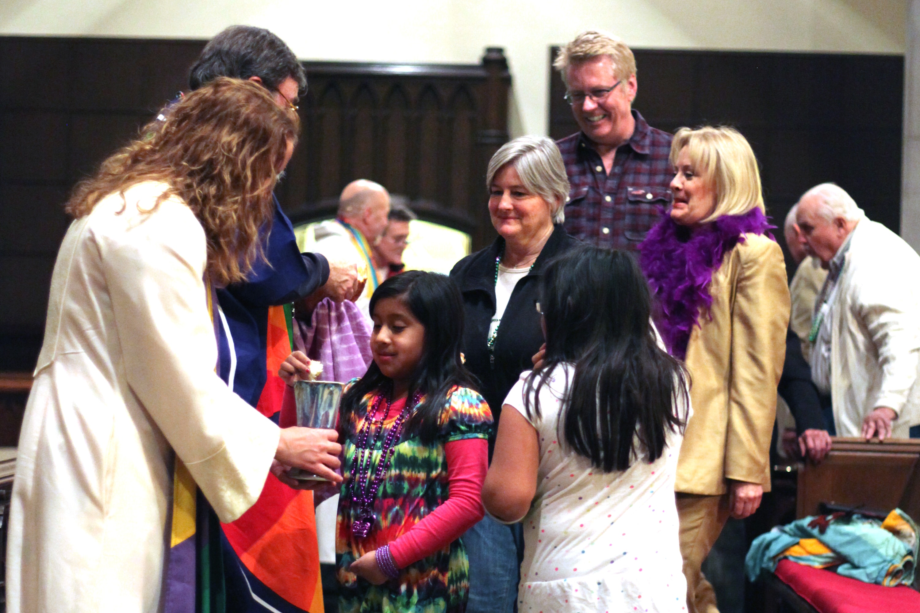 Communion is celebrated during a Shrove Tuesday celebration at West End United Methodist Church, Nashville, Tenn. Photo by Joey Butler, UM News.