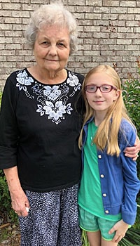Delores Howell (left) calls nine-year-old Haleigh her angel after suffering a fall. Haleigh comforted Delores, cleaned her Delores Howell (left) calls nine-year-old Haleigh her angel after suffering a fall. Haleigh comforted Delores, cleaned her