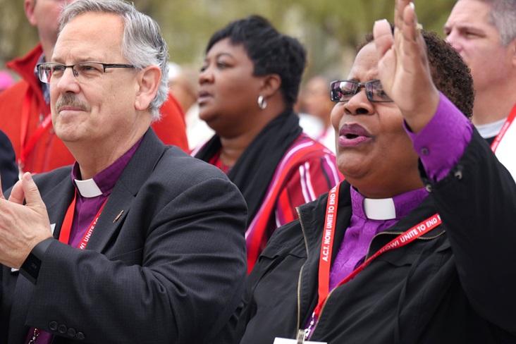 United Methodist Bishops Bruce R. Ough and LaTrelle Easterling stand in solidarity during the 2018 national rally to end racism. File photo by Kathy L. Gilbert, United Methodist Communications. United Methodist Bishops Bruce R. Ough and LaTrelle Easterling stand in solidarity during the 2018 national rally to end racism. File photo by Kathy L. Gilbert, United Methodist Communications.