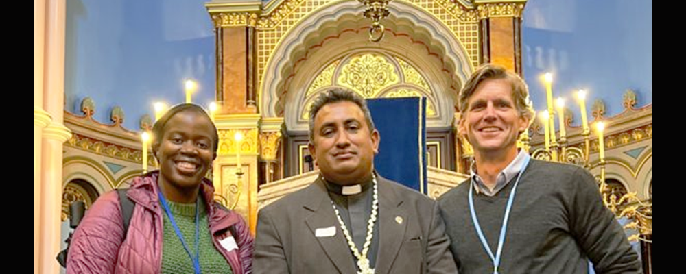 GBCS staff members Laura Kigweba James, left, and John Hill, right, with the Rev. James Bhagwan, a Methodist minister from Fiji, at a COP26 interfaith service and dialogue Oct. 31 at Garnethill Synagogue in Glasgow.