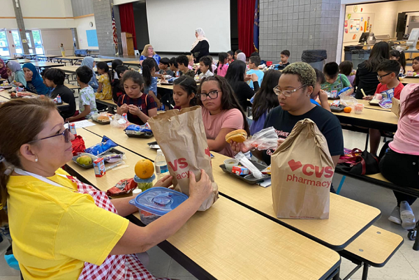 Children participate in a month-long, VBS-style program hosted by Centro Familiar Cristiano United Methodist Church near Detroit.