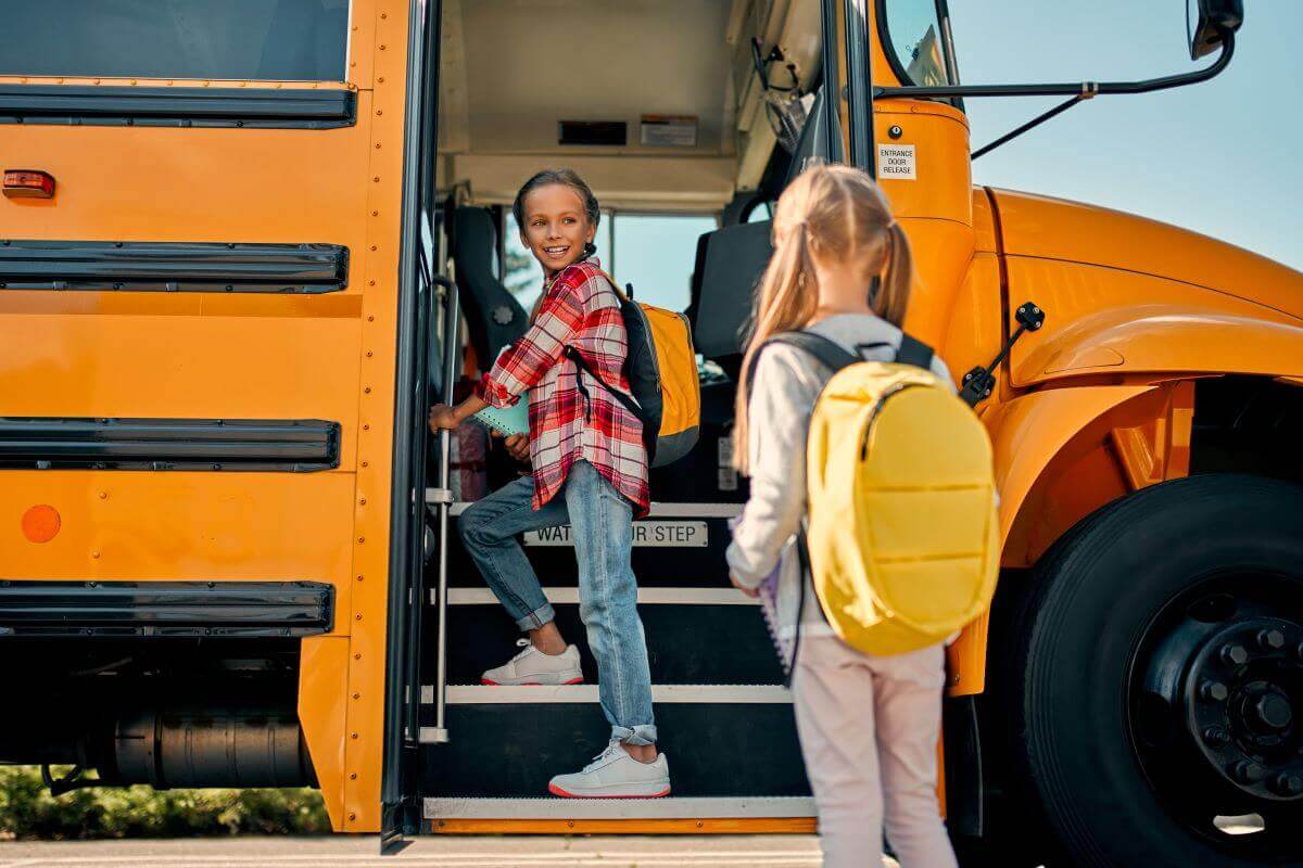 Children boarding a school bus