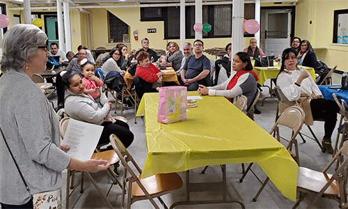 Rev. Lisa DePaz (left) with migrants and church members hosted at Haws Ave. UMC in Norristown, PA. Receipent of 2023 Mustard Seed Migration Grant. (Photo: Courtesy of Haws Ave. UMC)