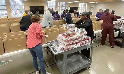 Volunteers prepare boxes for the 2024 Thanksgiving distribution to families needing assistance with the Thanksgiving feast. (Photo: Courtesy of Hope UMC)