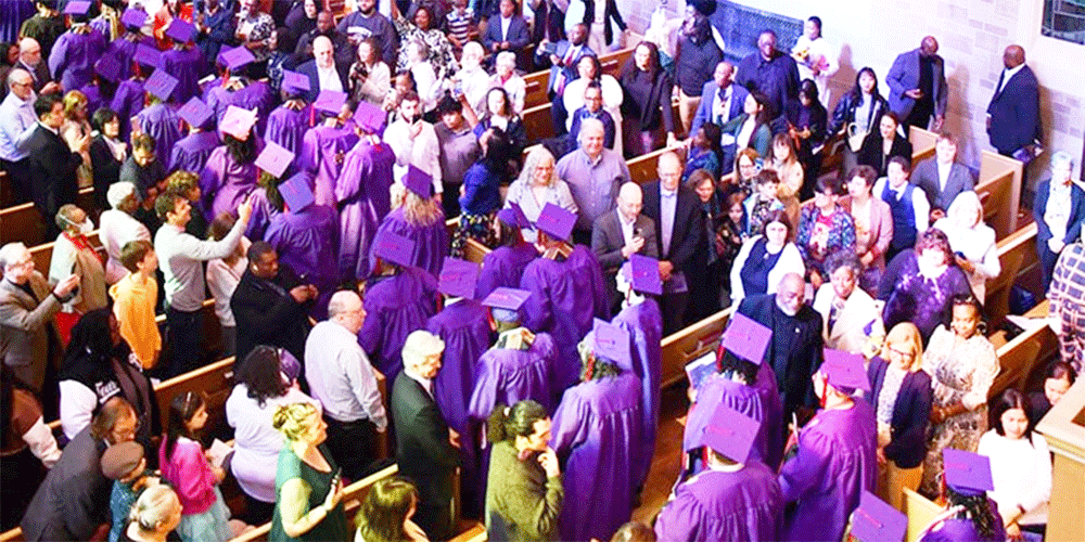 Graduates process into Northwestern University's Alice Millar Chapel during the 2025 Commencement ceremony for Garrett-Evangelical Theology Seminary.