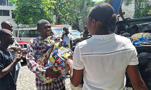 Methodists in Haiti distribute food aid through their parish circuits to help with shortages during the current crisis. (Photo: Courtesy of EMH, MCCA-Haiti)
